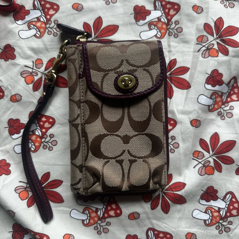 COACH Brown and maroon zip wristlet